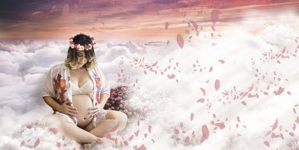 pregnant woman on clouds