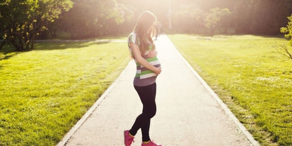 pregnant woman in a park