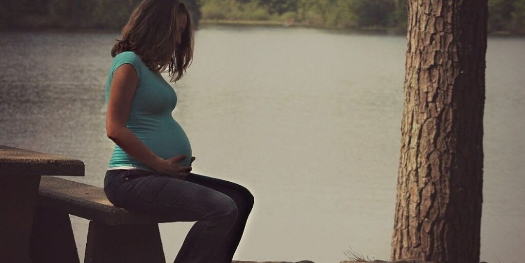 pregnant woman sitting