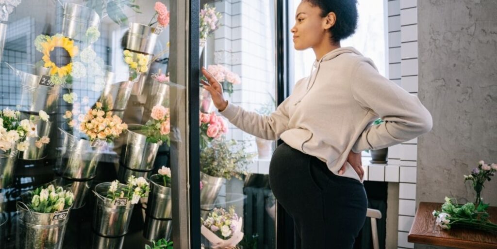 pregnant woman in flower shop