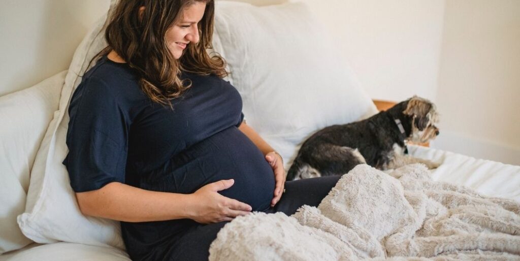 pregnant woman with dog